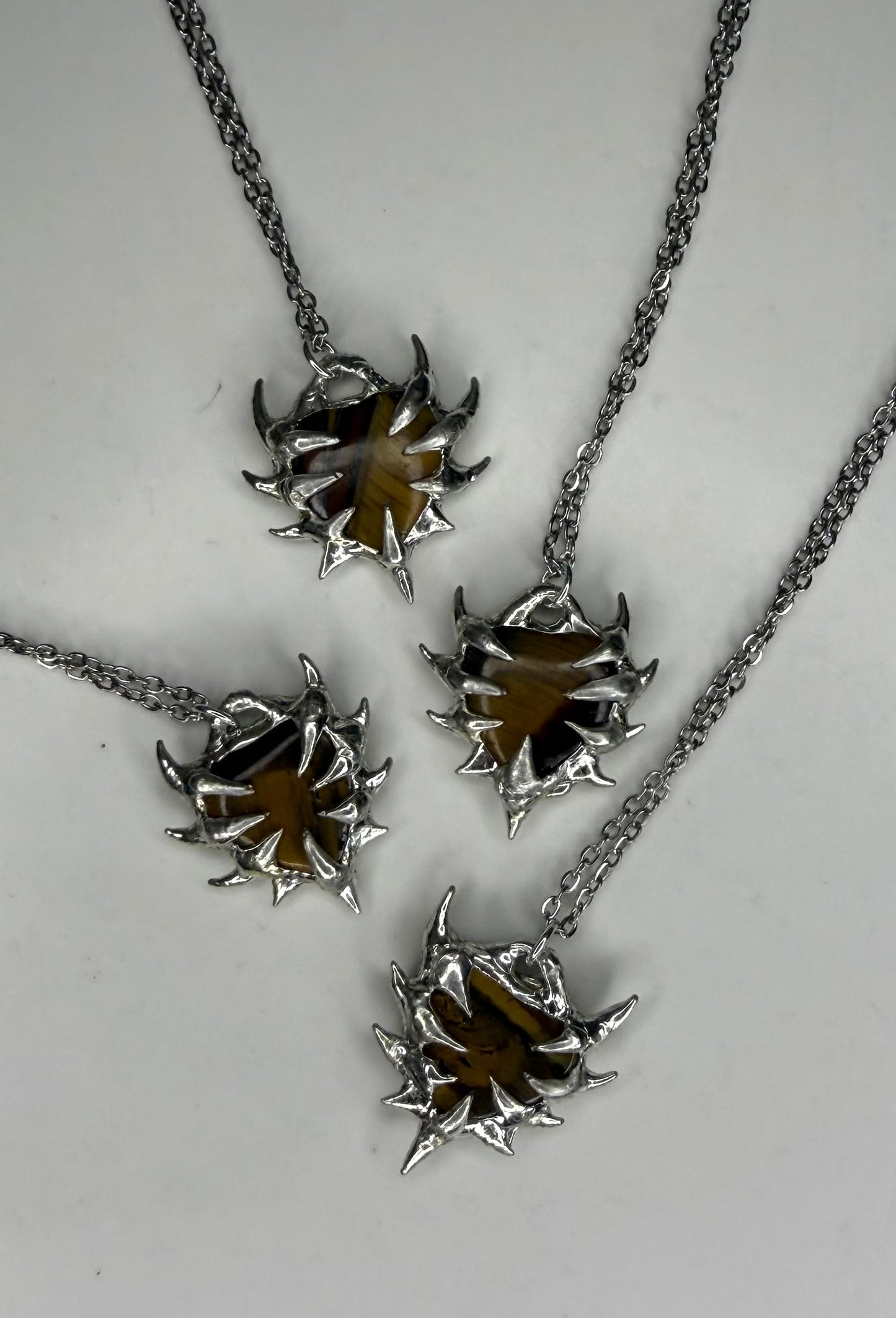 Tiger eye spiked hearts