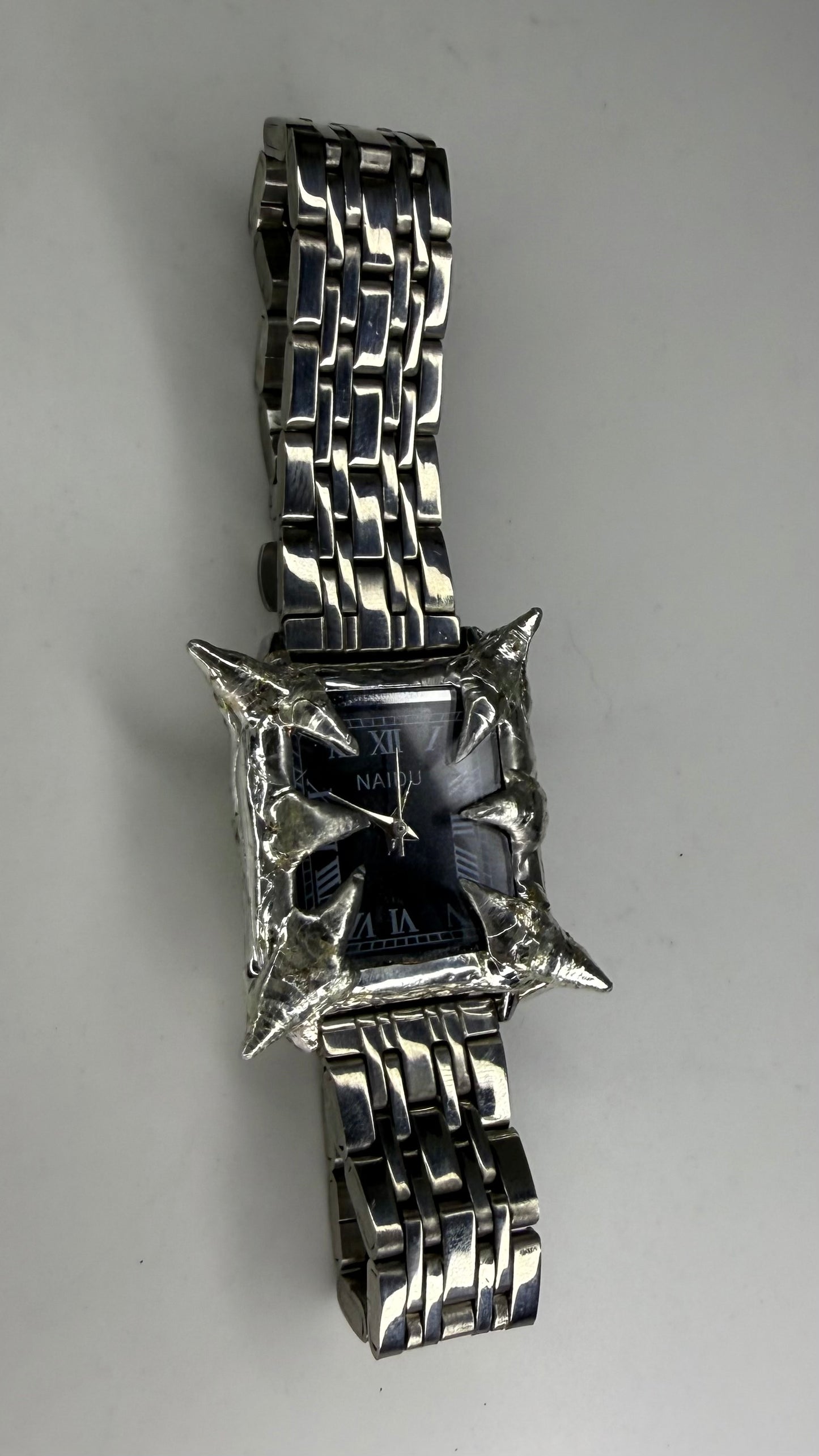 Black spiked watch