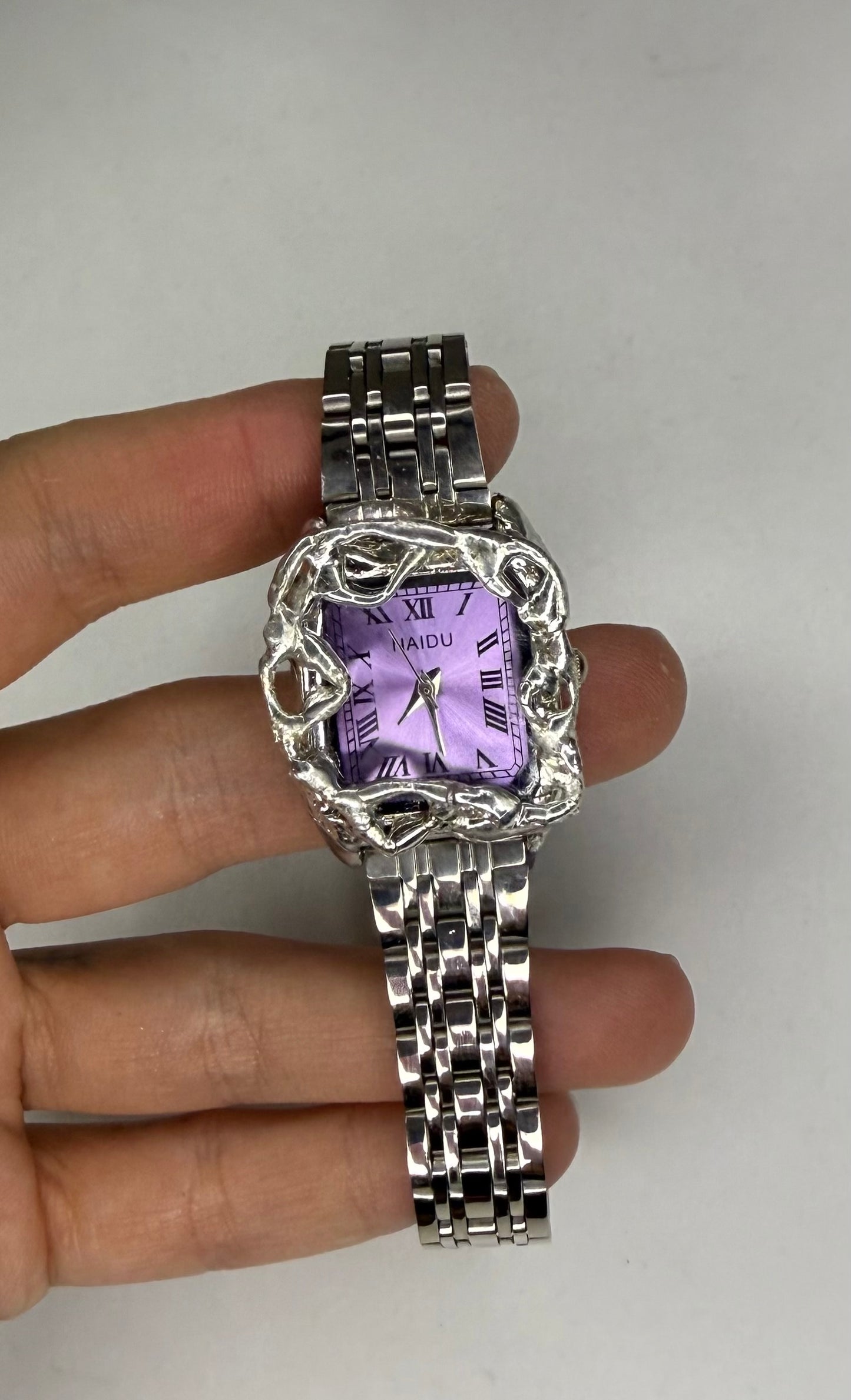 Purple wavy watch