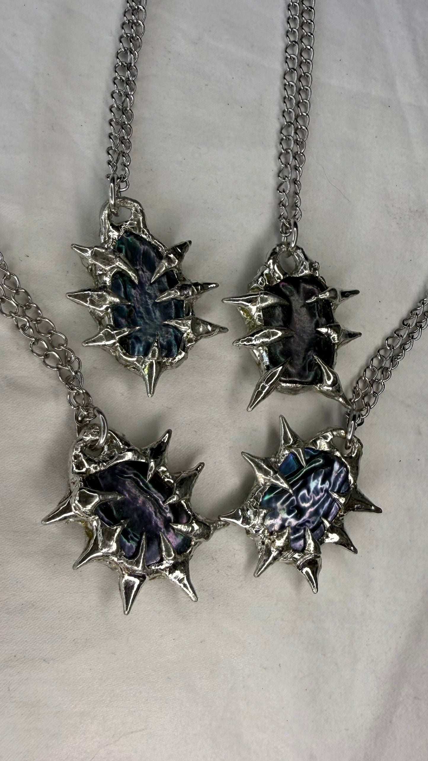 Dark pearl necklaces