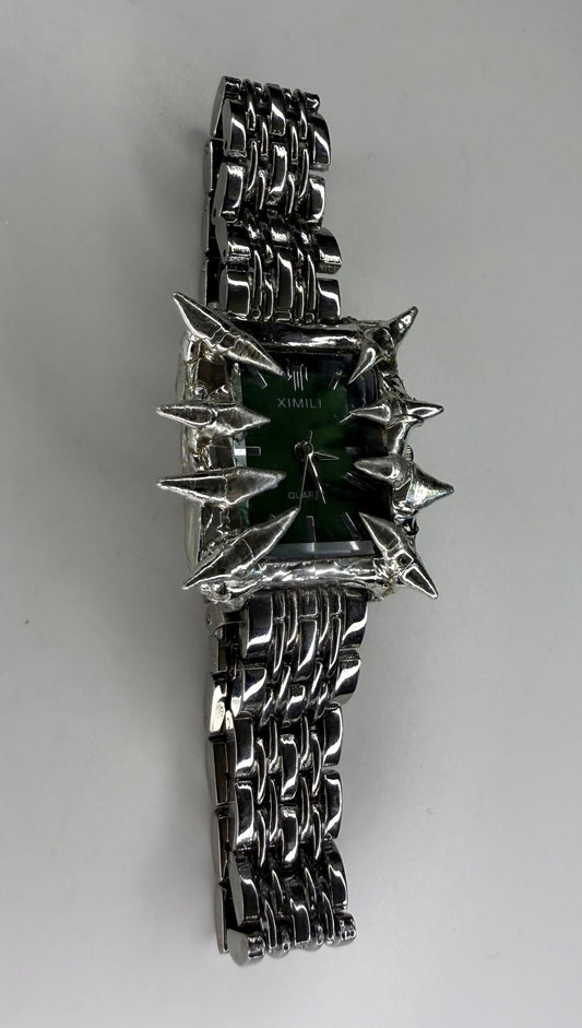 Green spiked watch