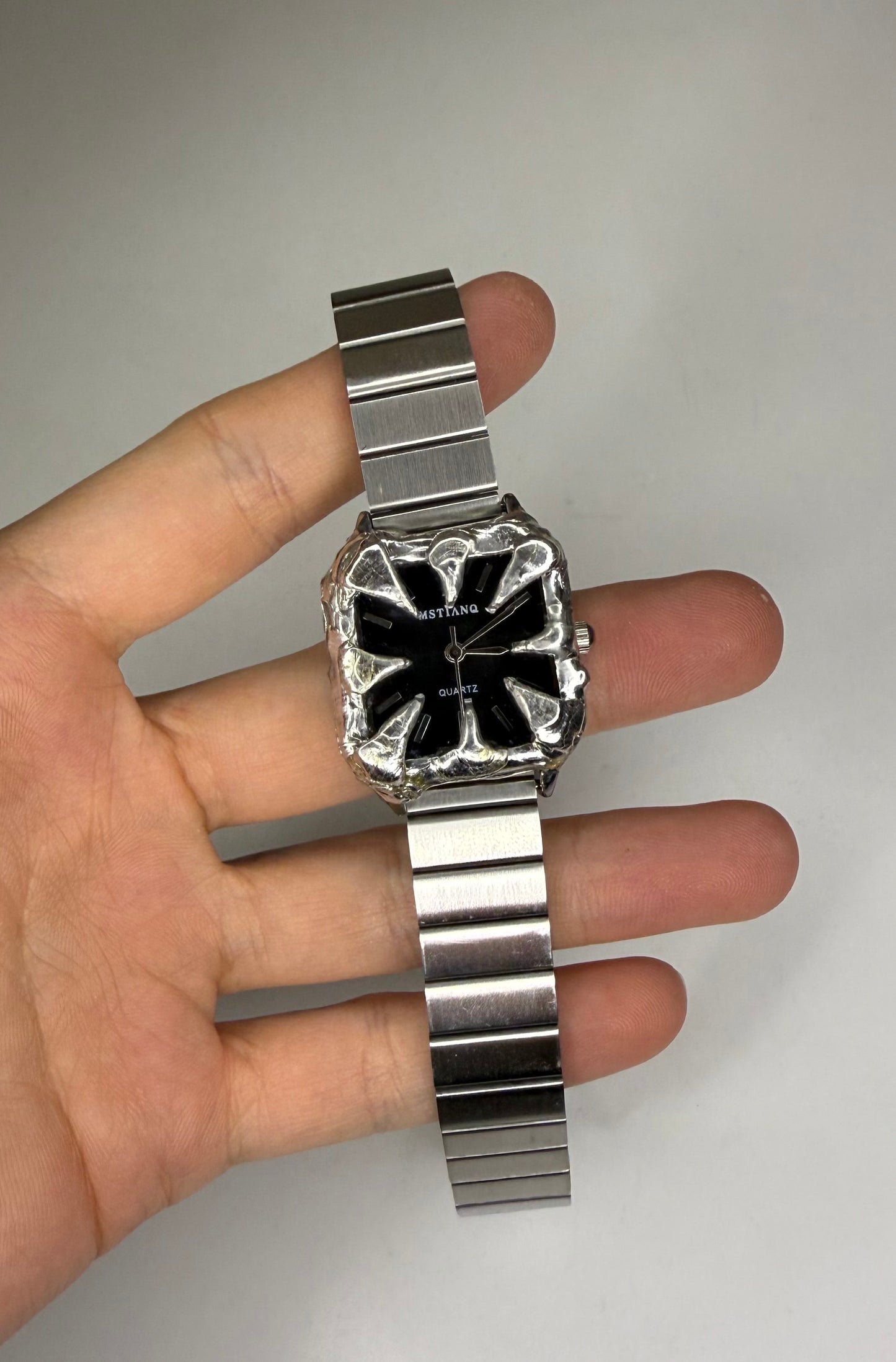 Black spiked watch