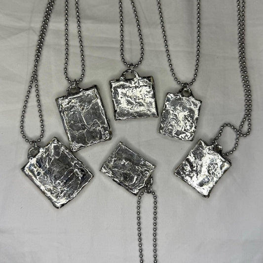 Spiked Flower Pendants