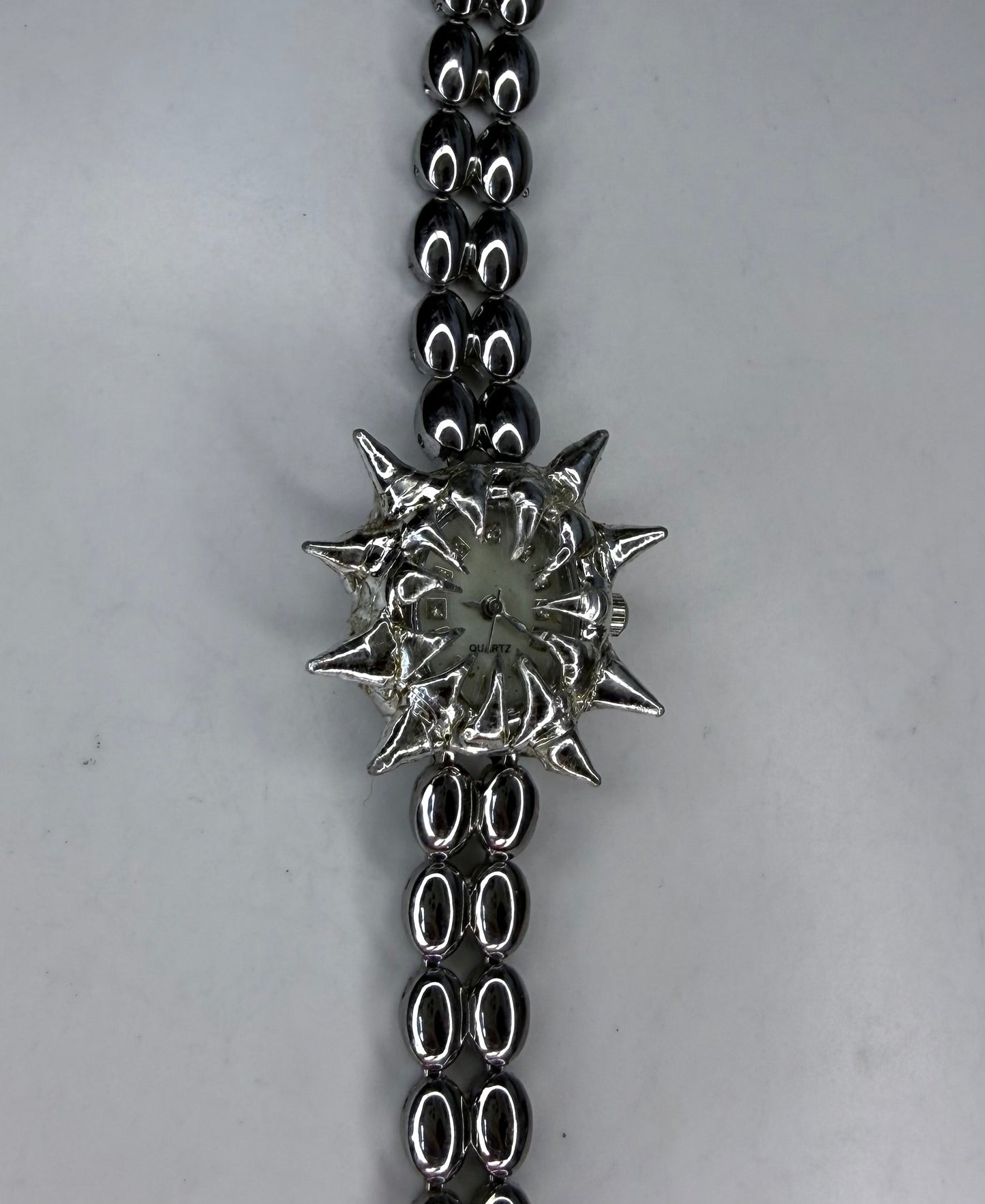 White spiked Watch