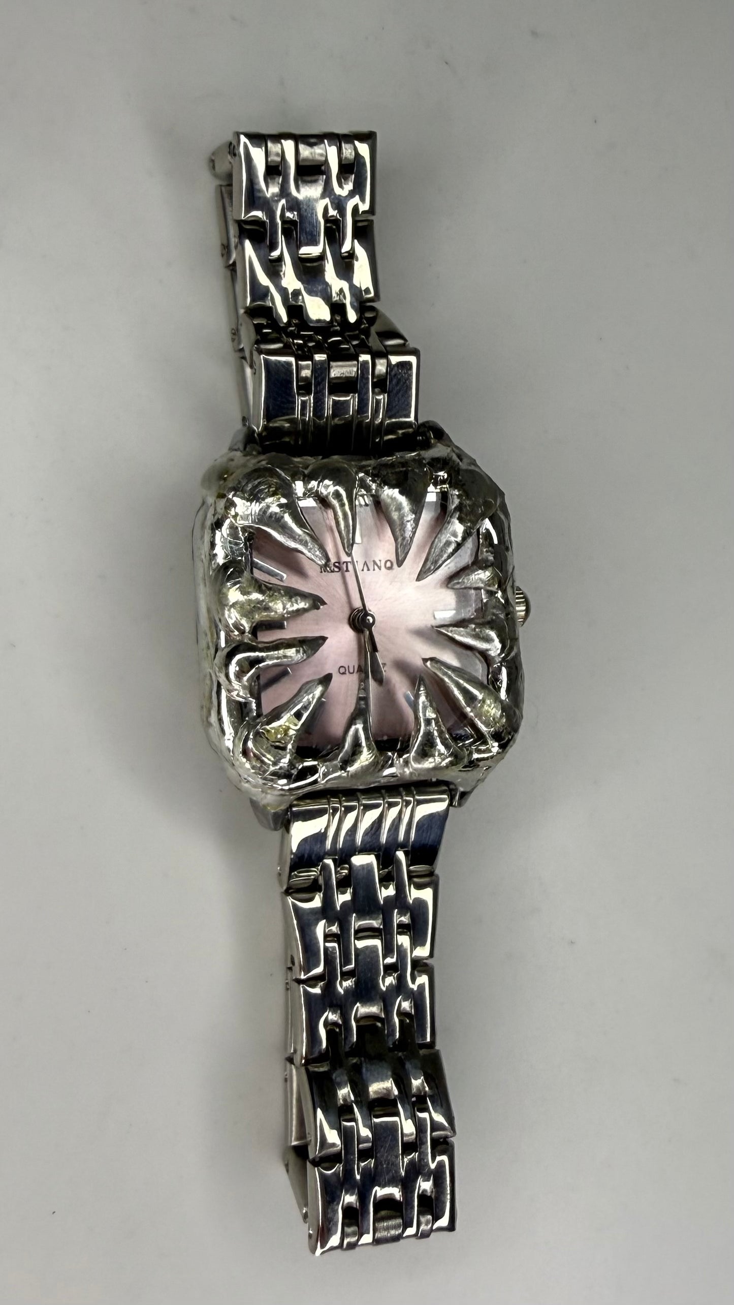 Pink spiked watch