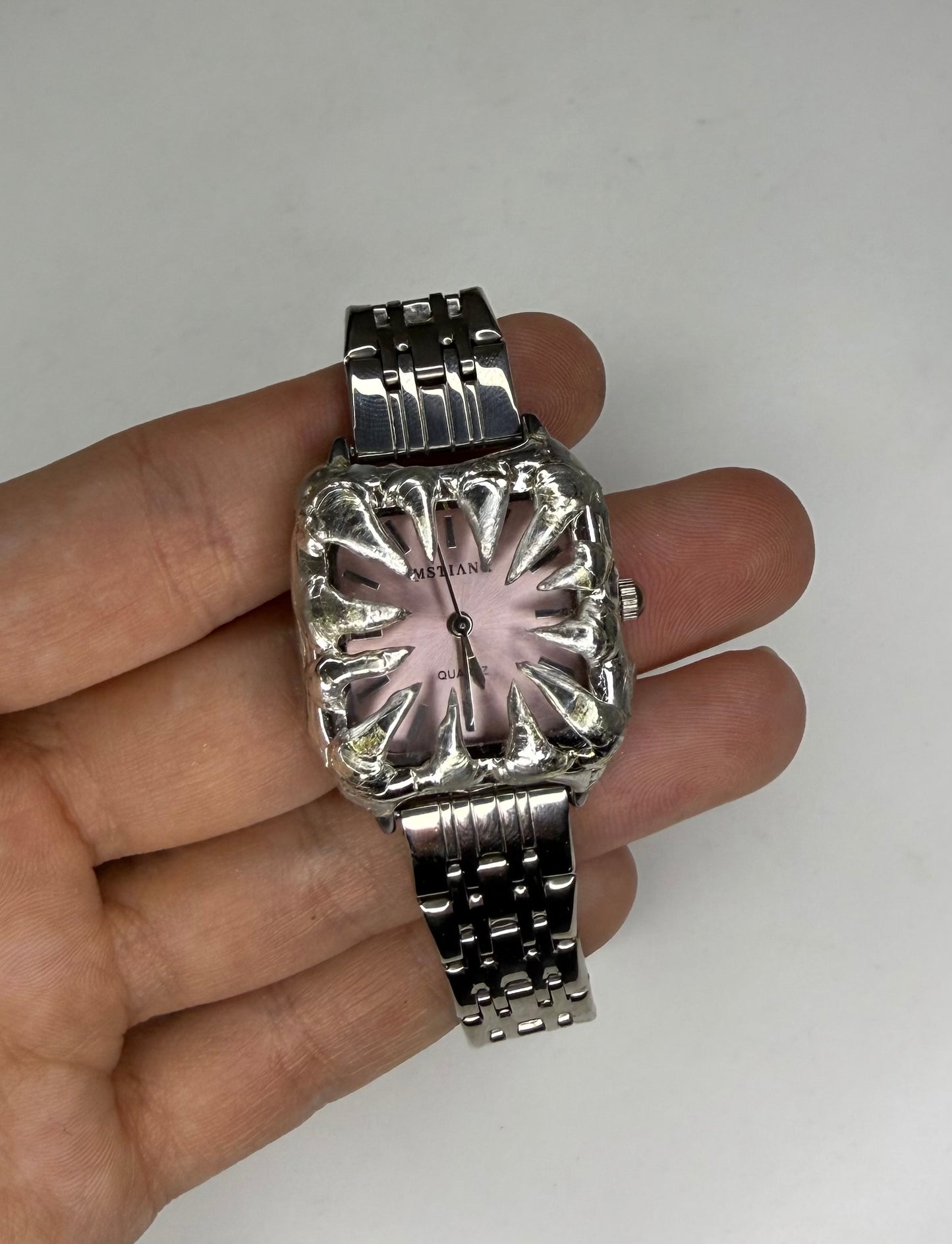 Pink spiked watch
