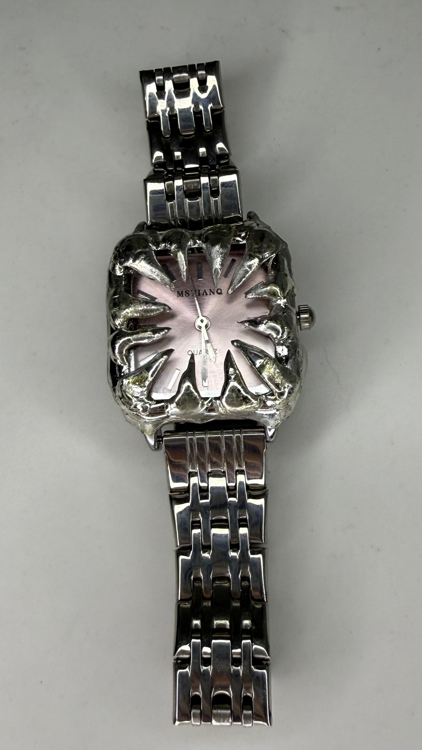 Pink spiked watch