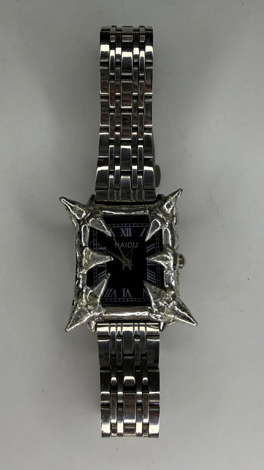 Black spiked watch