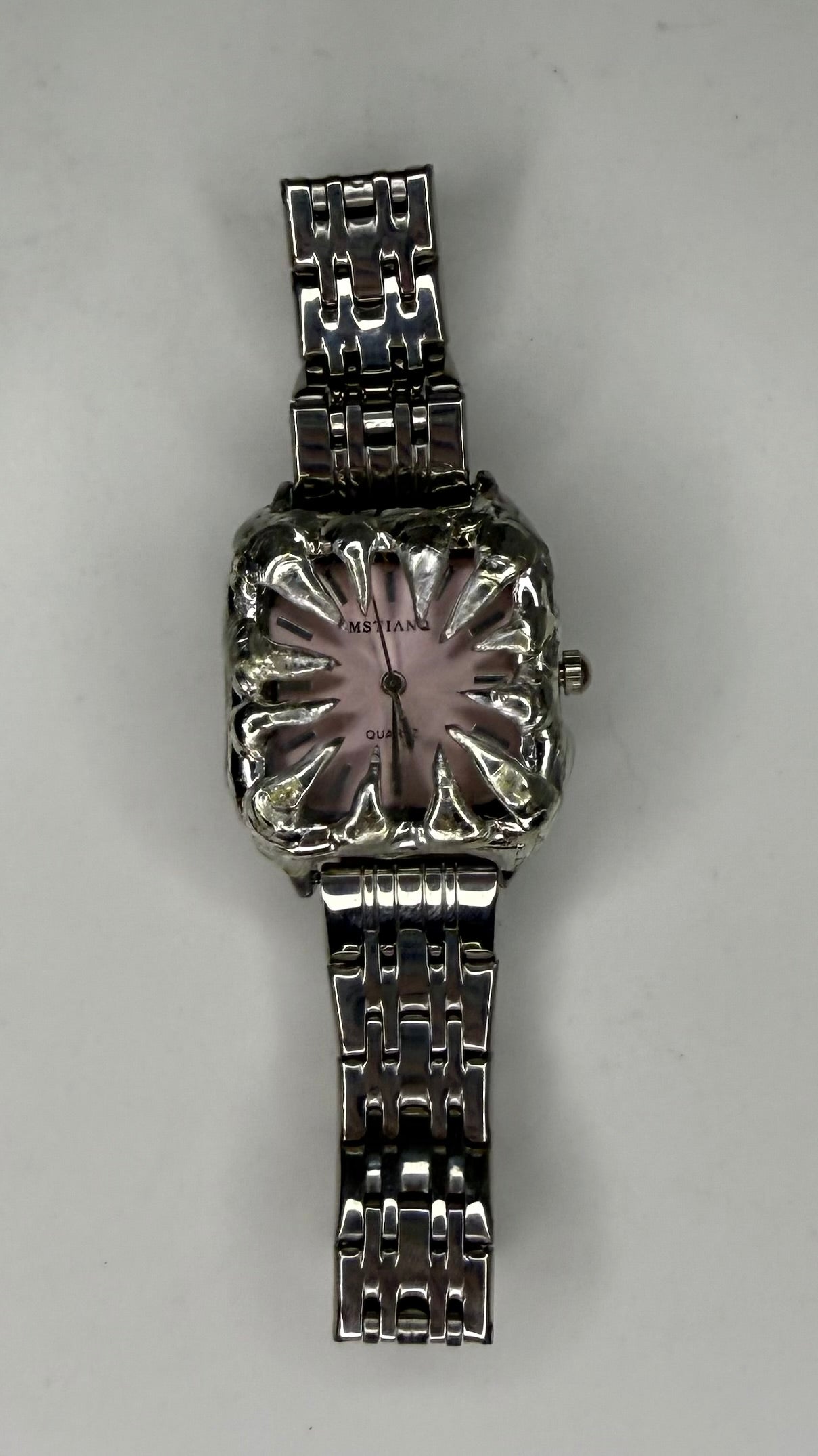 Pink spiked watch