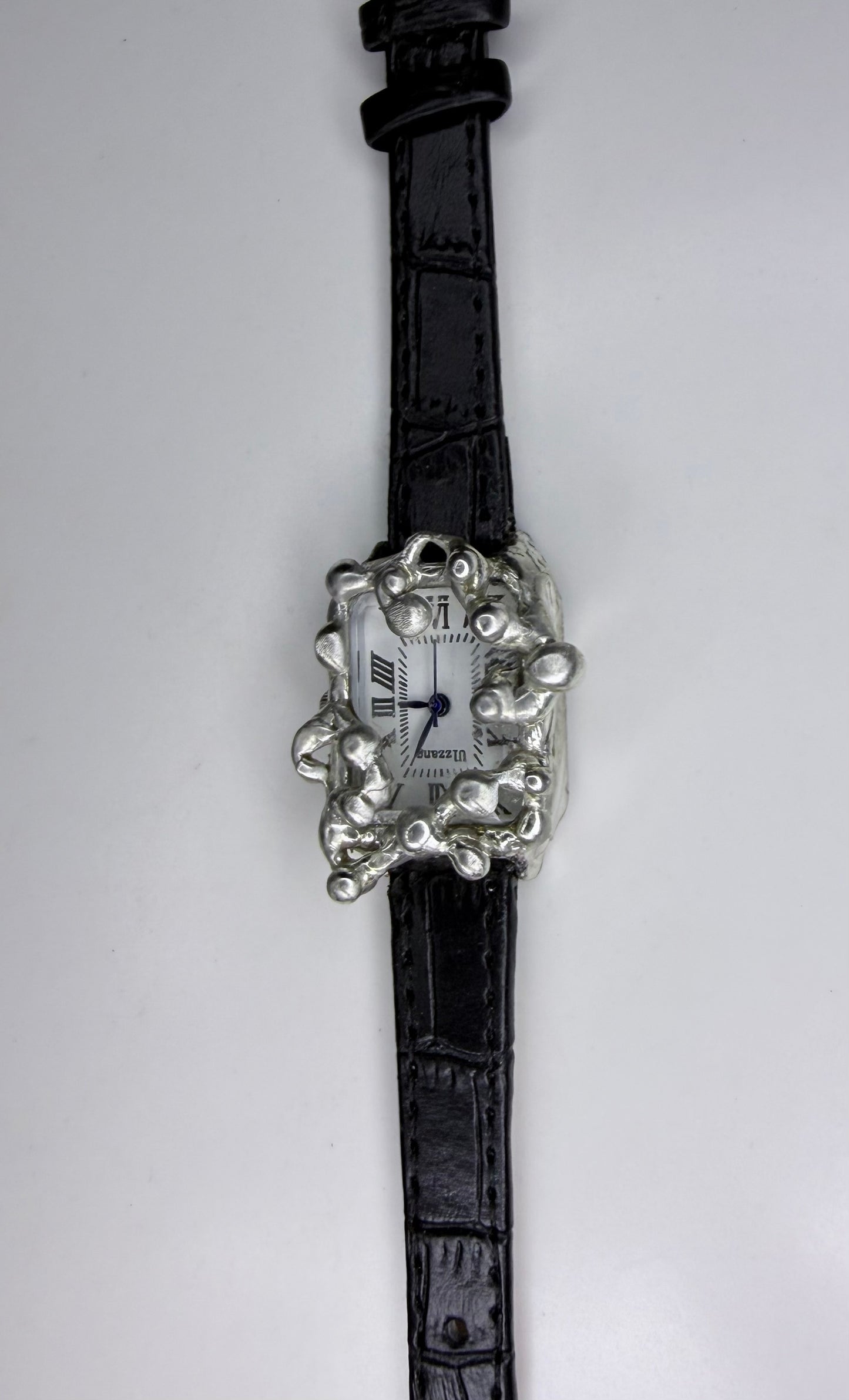 Black faux leather watch