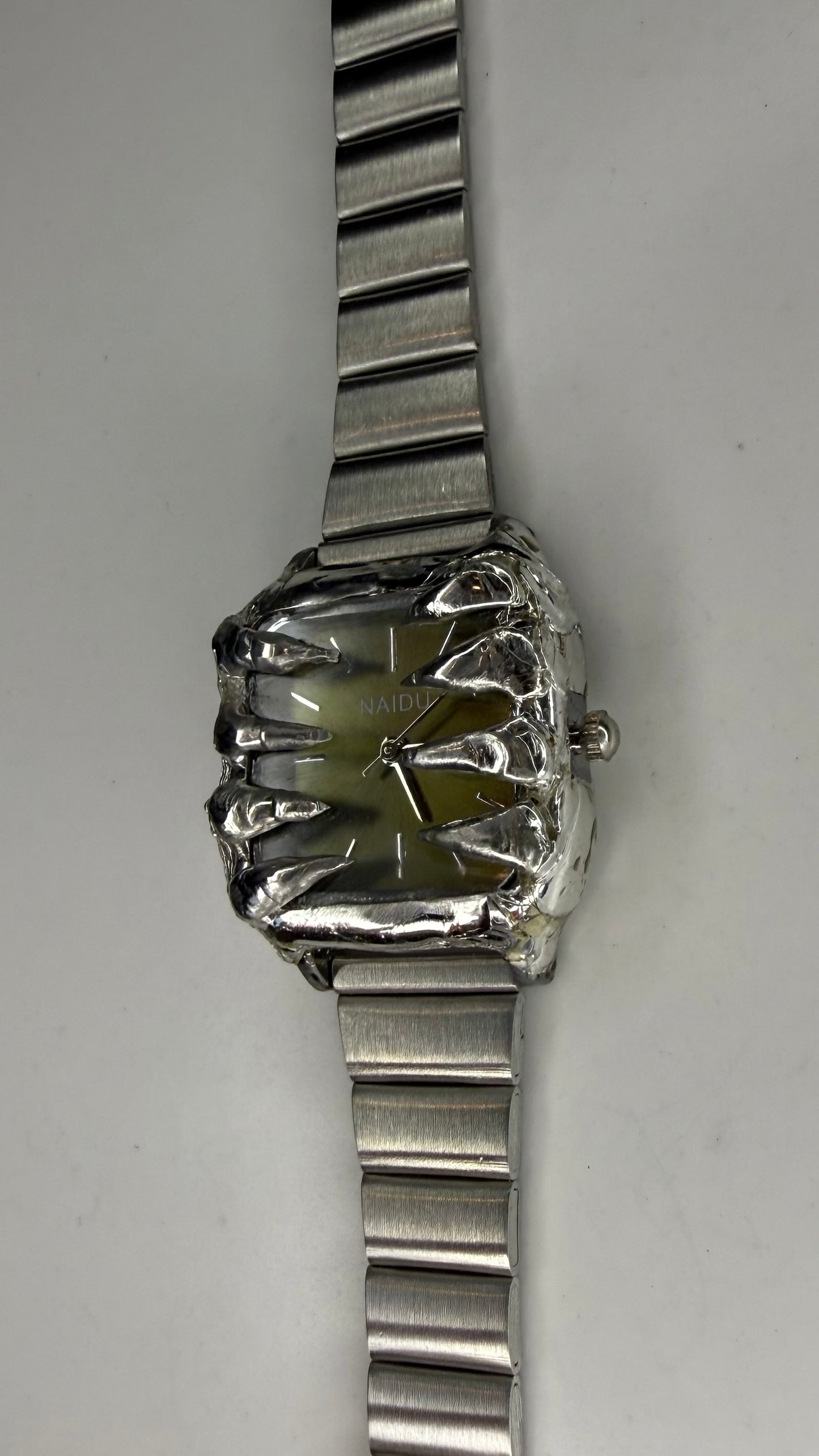 Green spiked watch