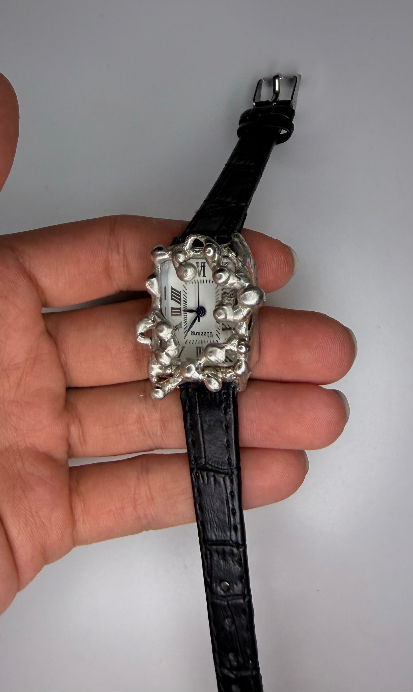 Black faux leather watch