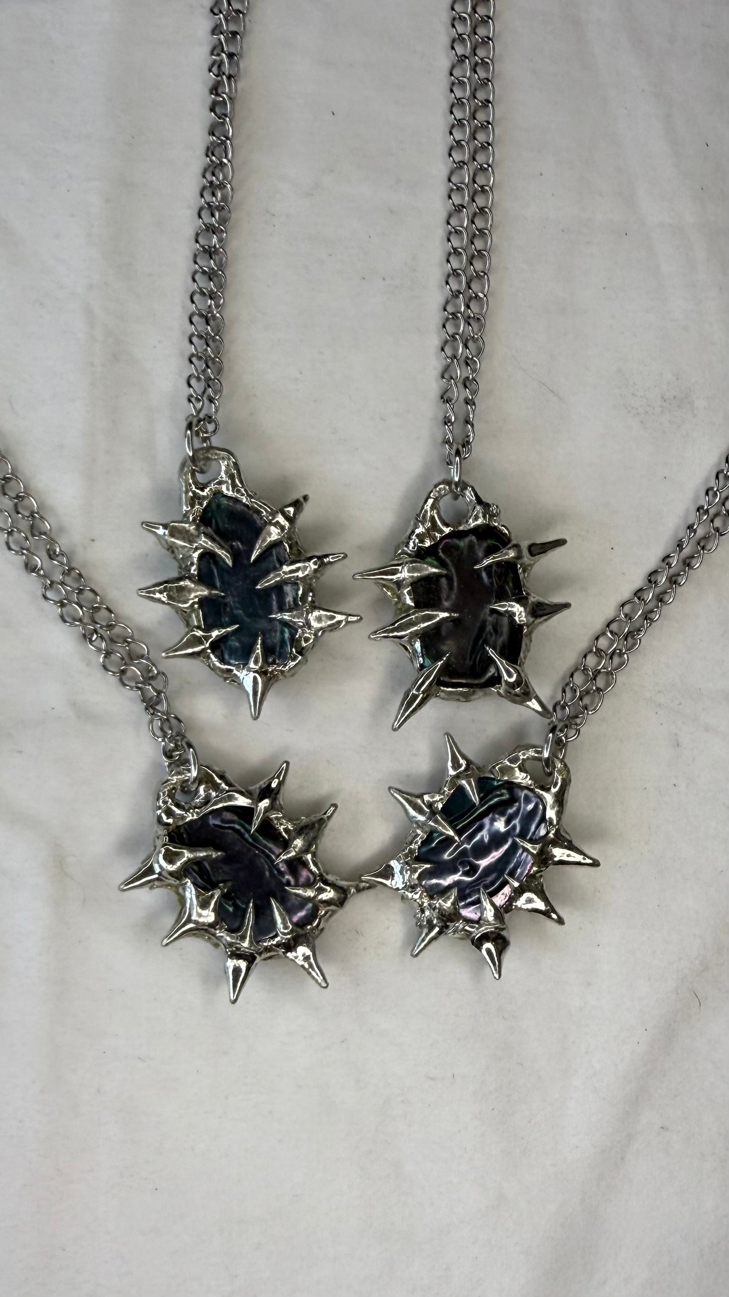 Dark pearl necklaces