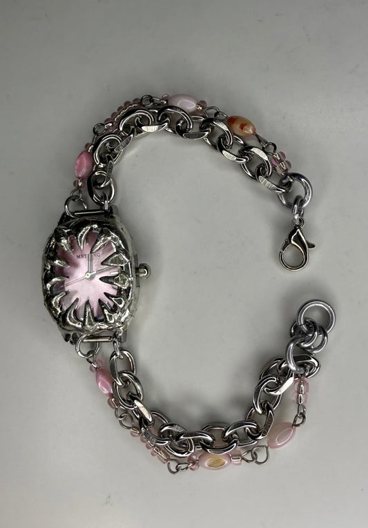 Pink spiked shell watch