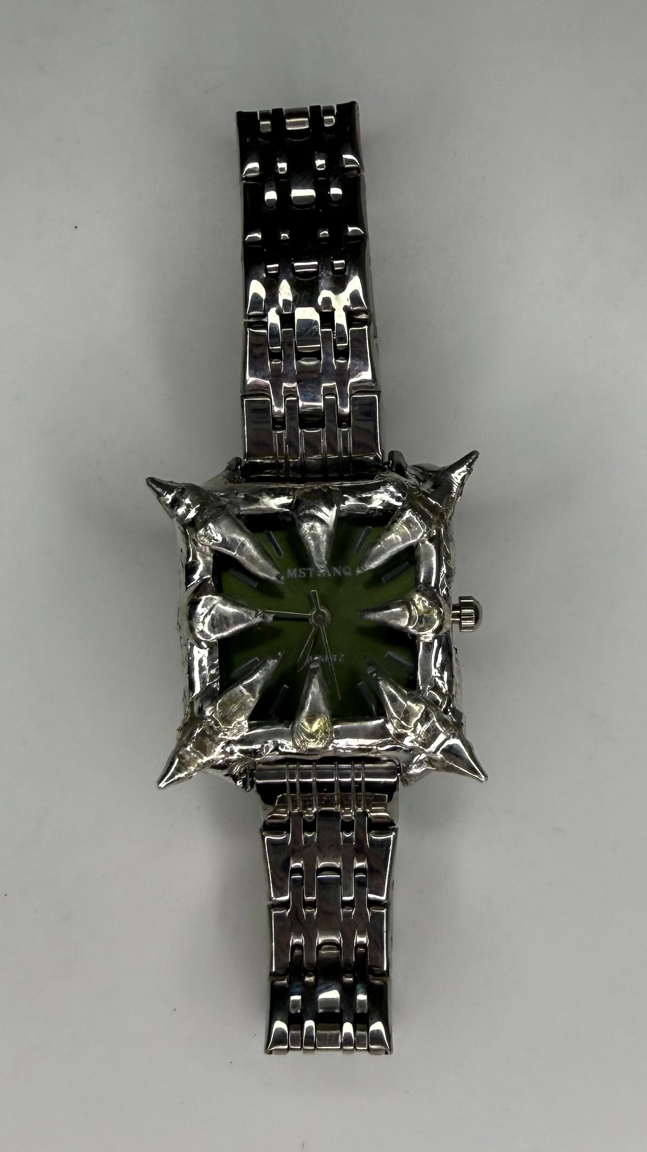 Green spiked Watch