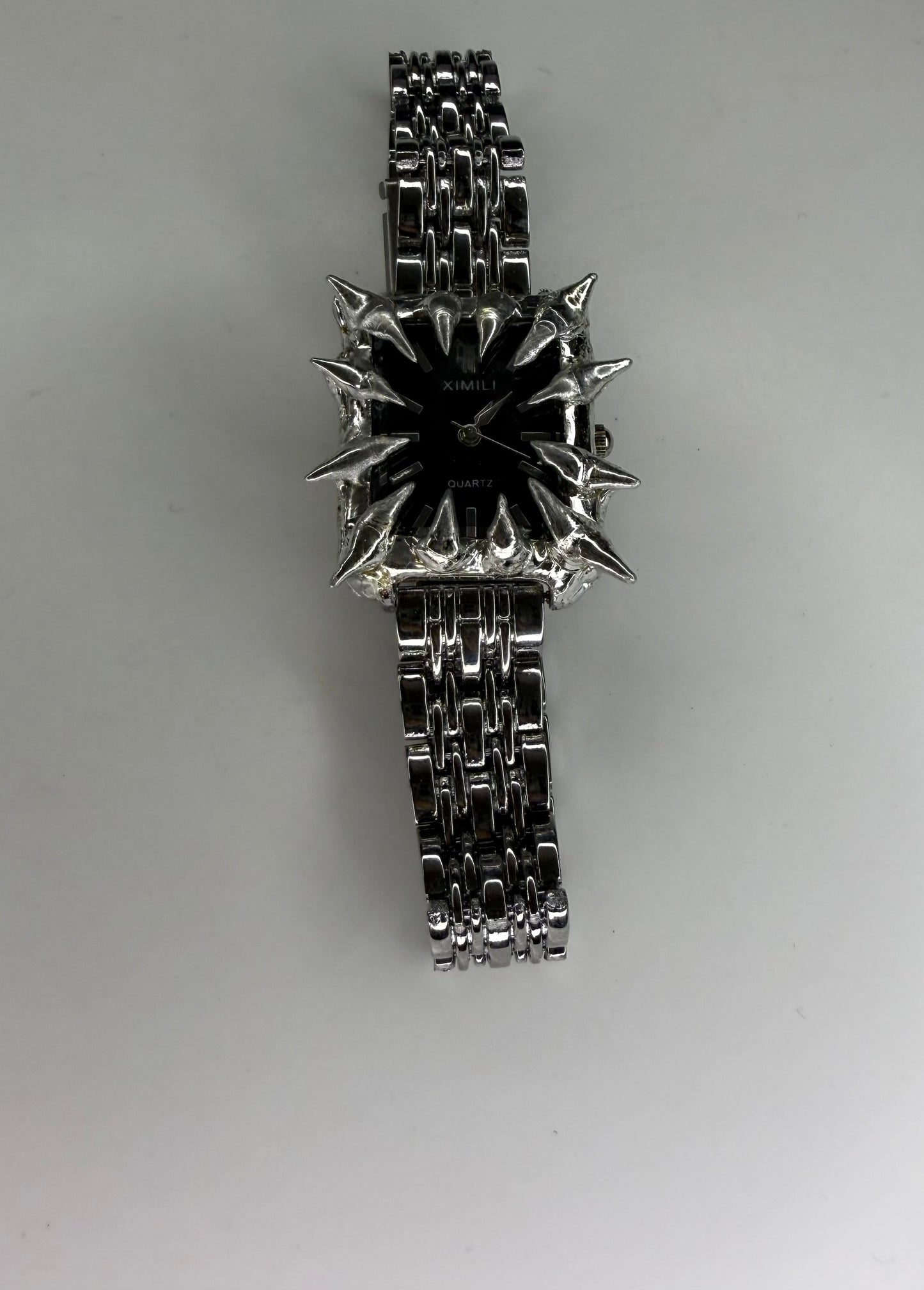 Black spiked watch