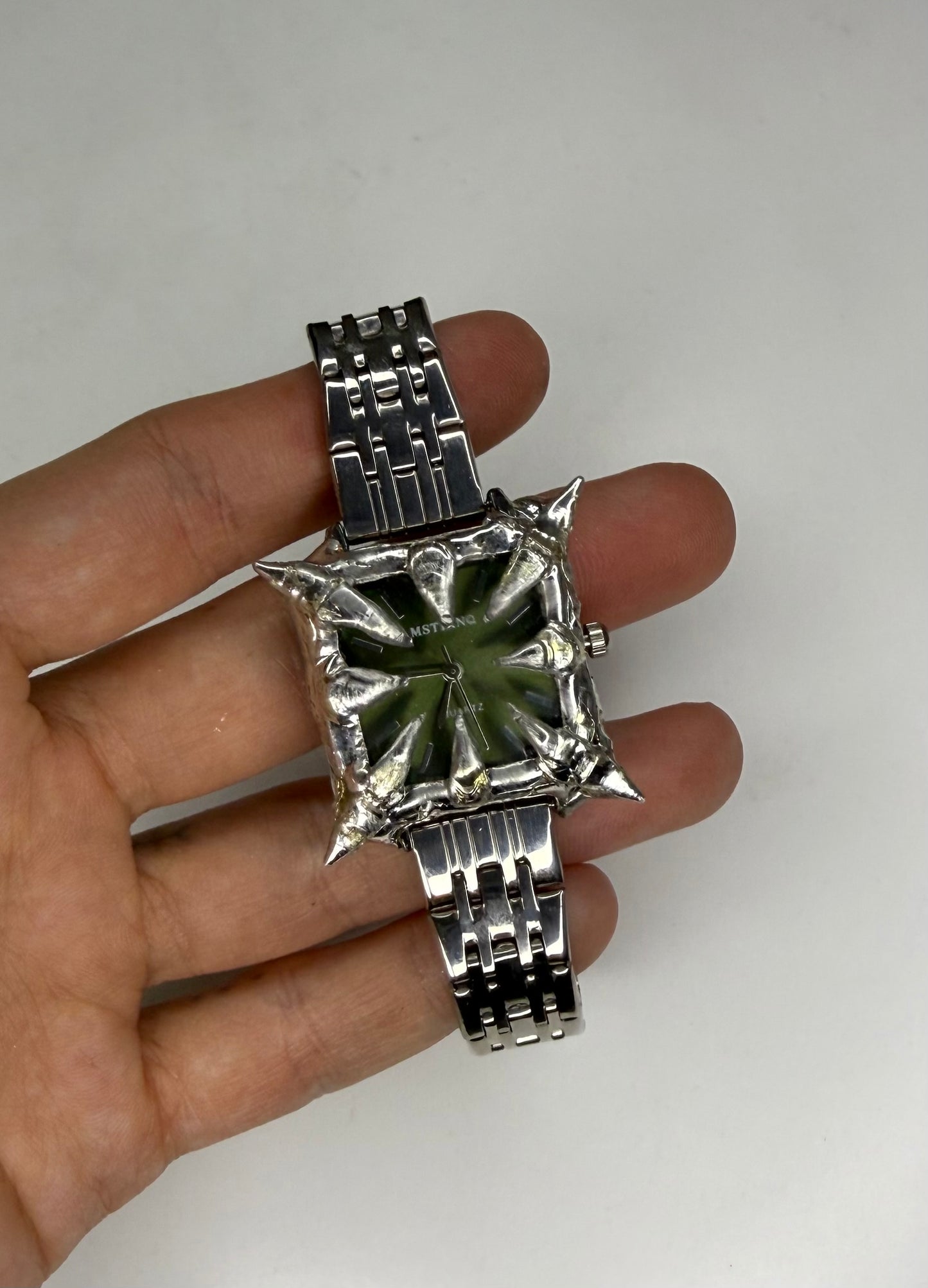 Green spiked Watch