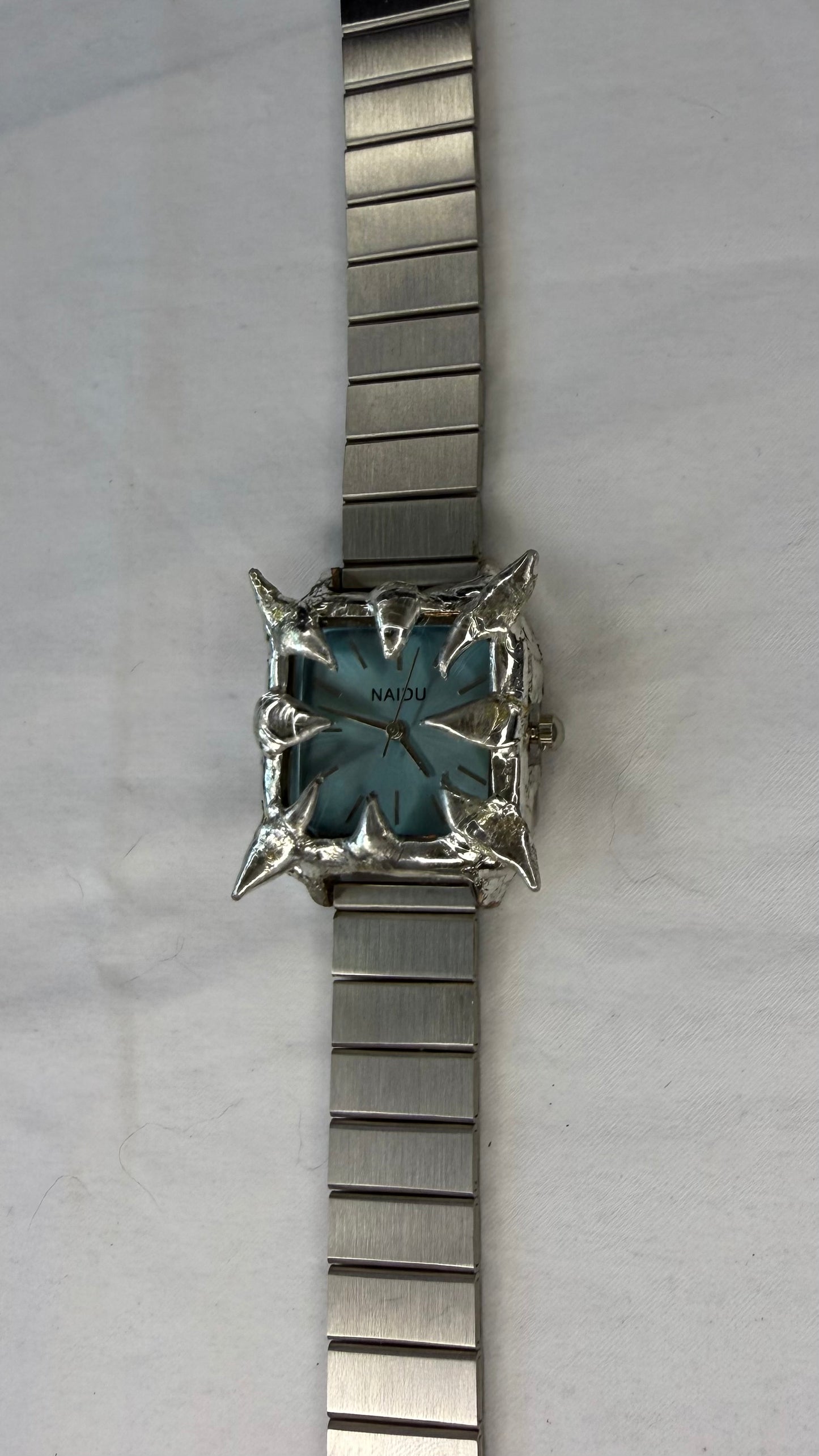 Blue spiked watch
