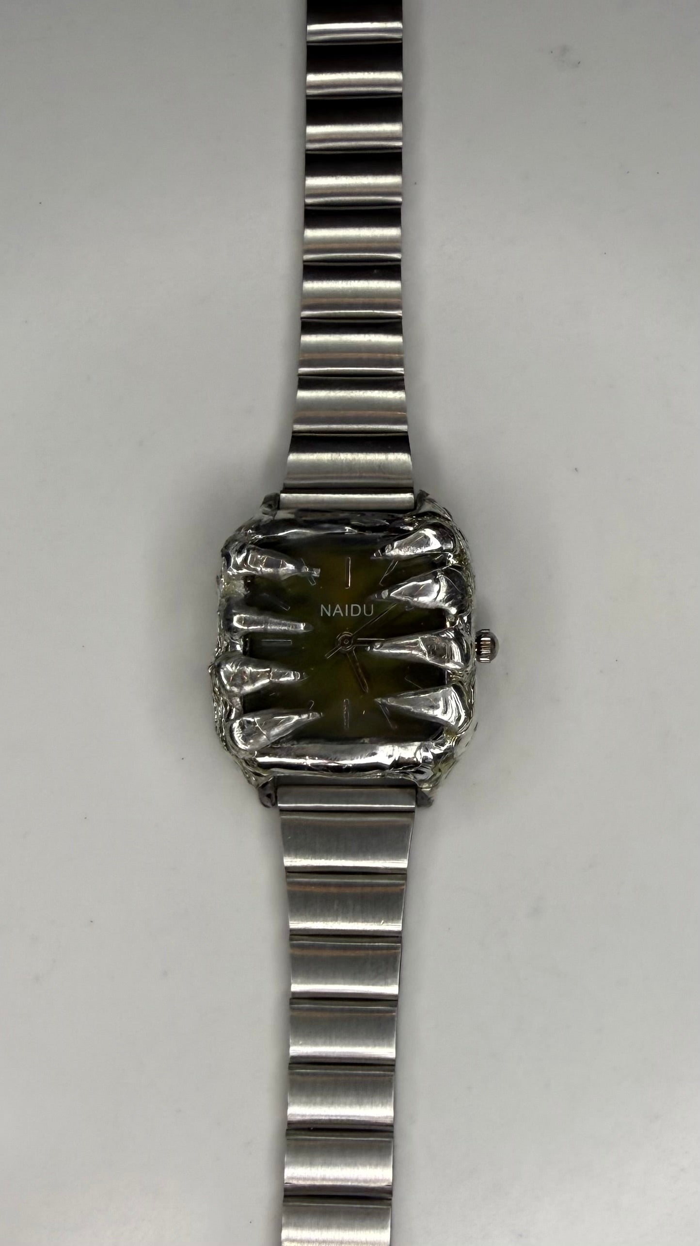 Green spiked watch