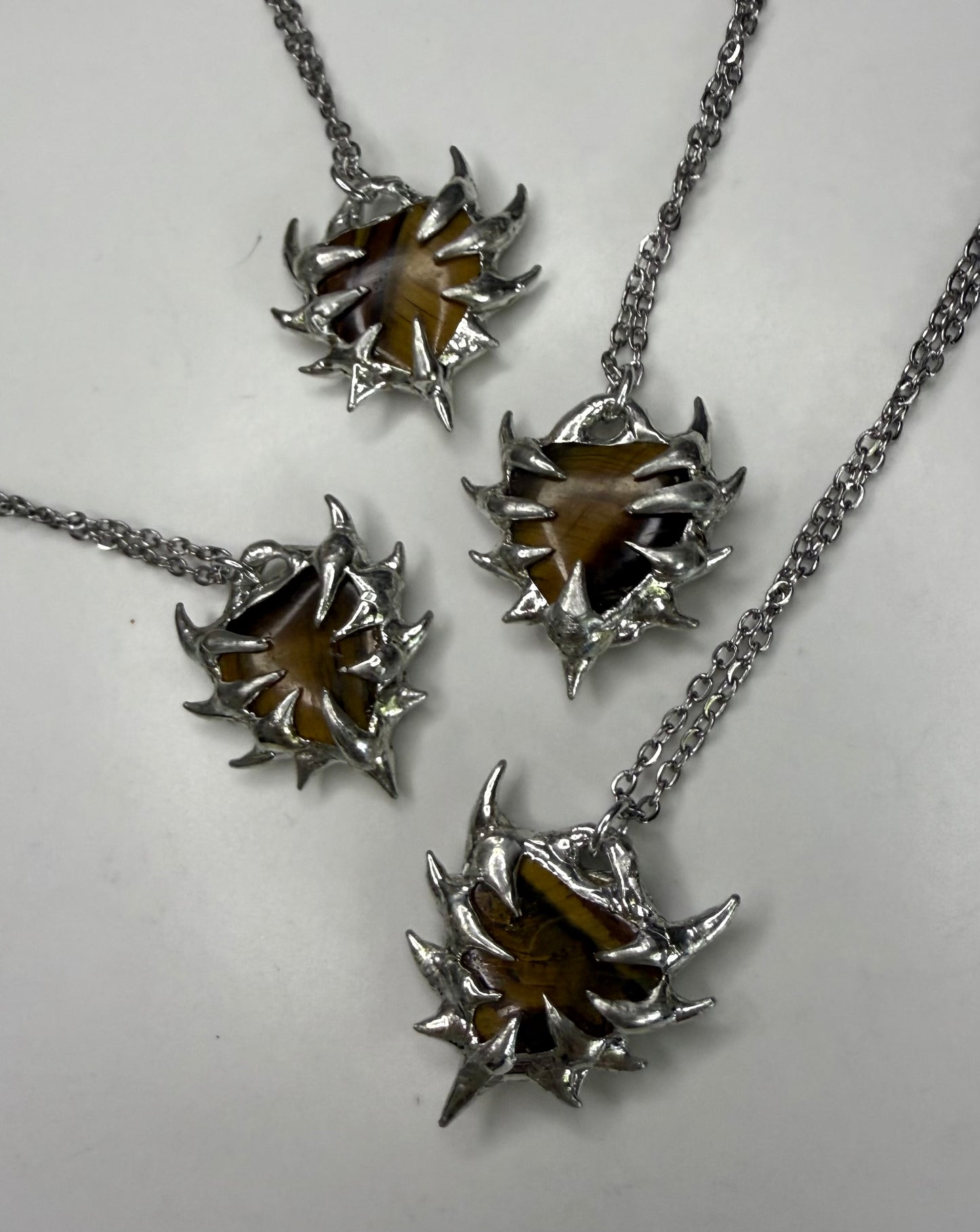 Tiger eye spiked hearts