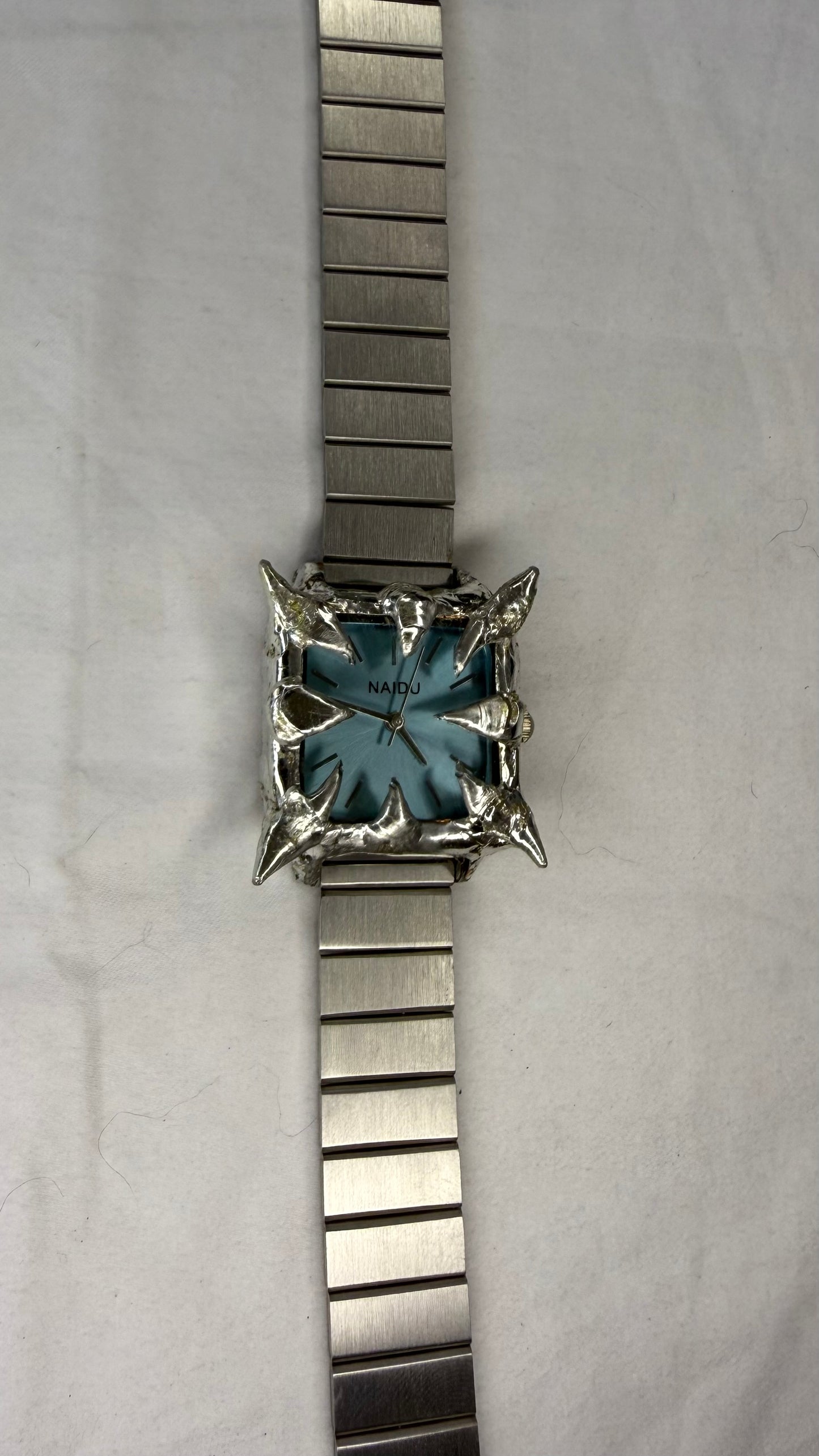 Blue spiked watch