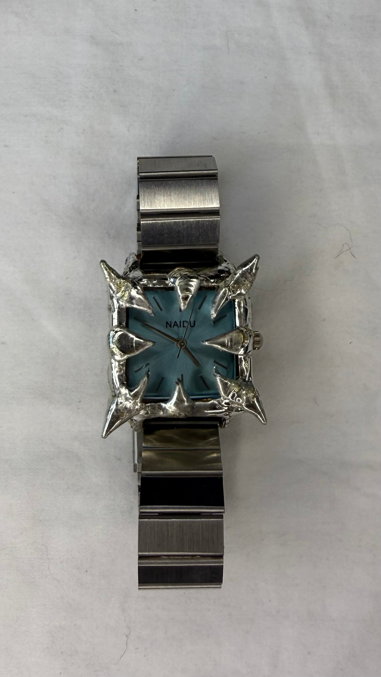 Blue spiked watch