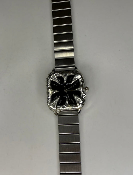 Black spiked watch
