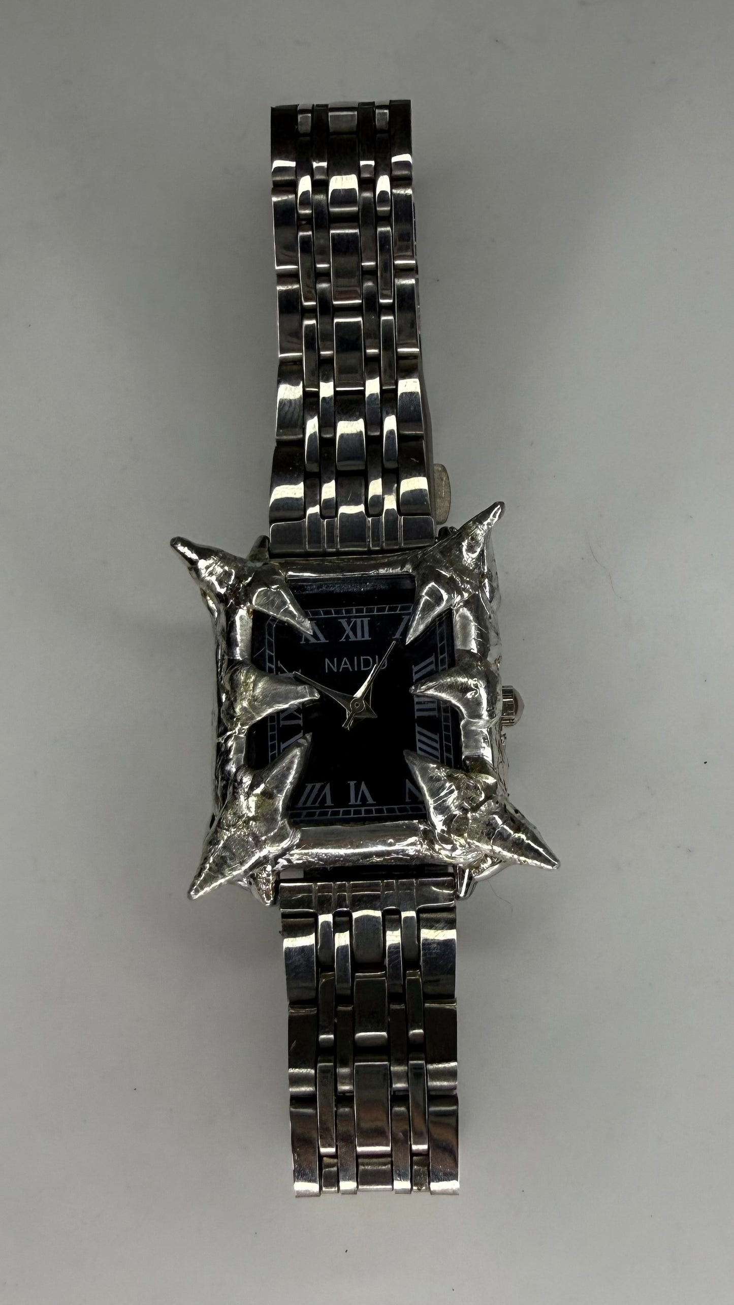 Black spiked watch