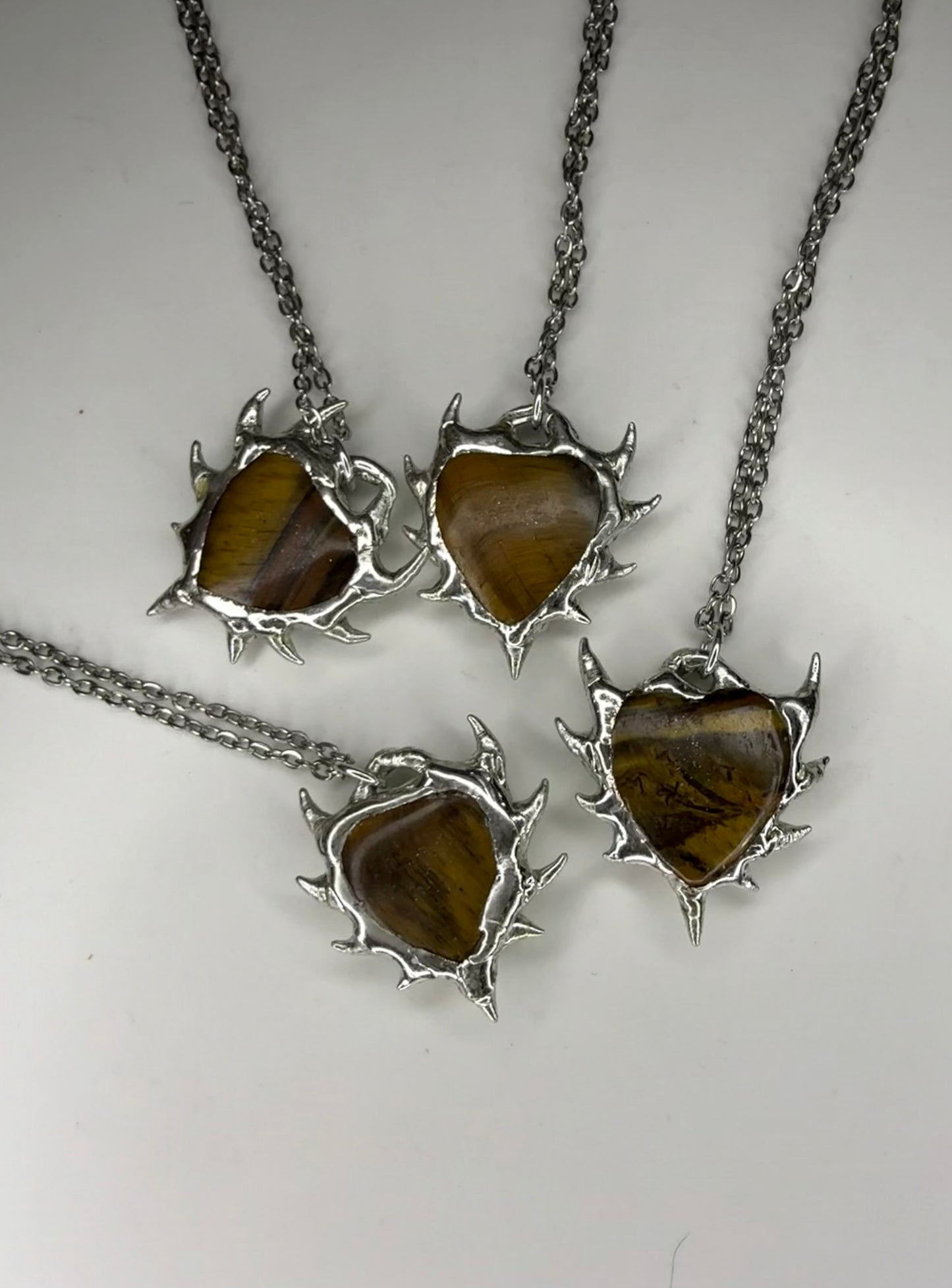 Tiger eye spiked hearts