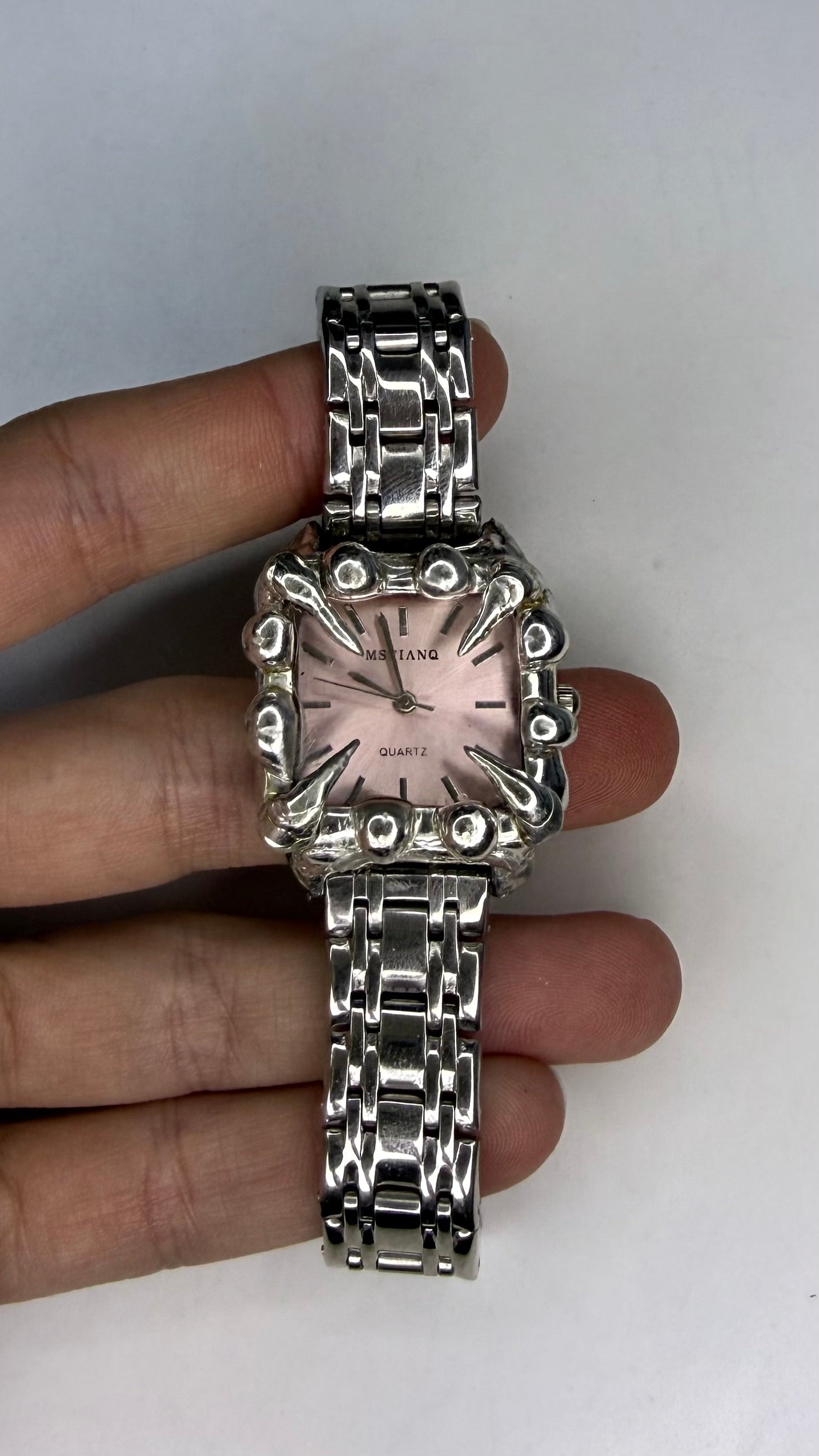 Pink spiked watch