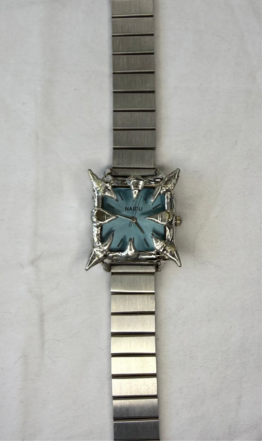 Blue spiked watch