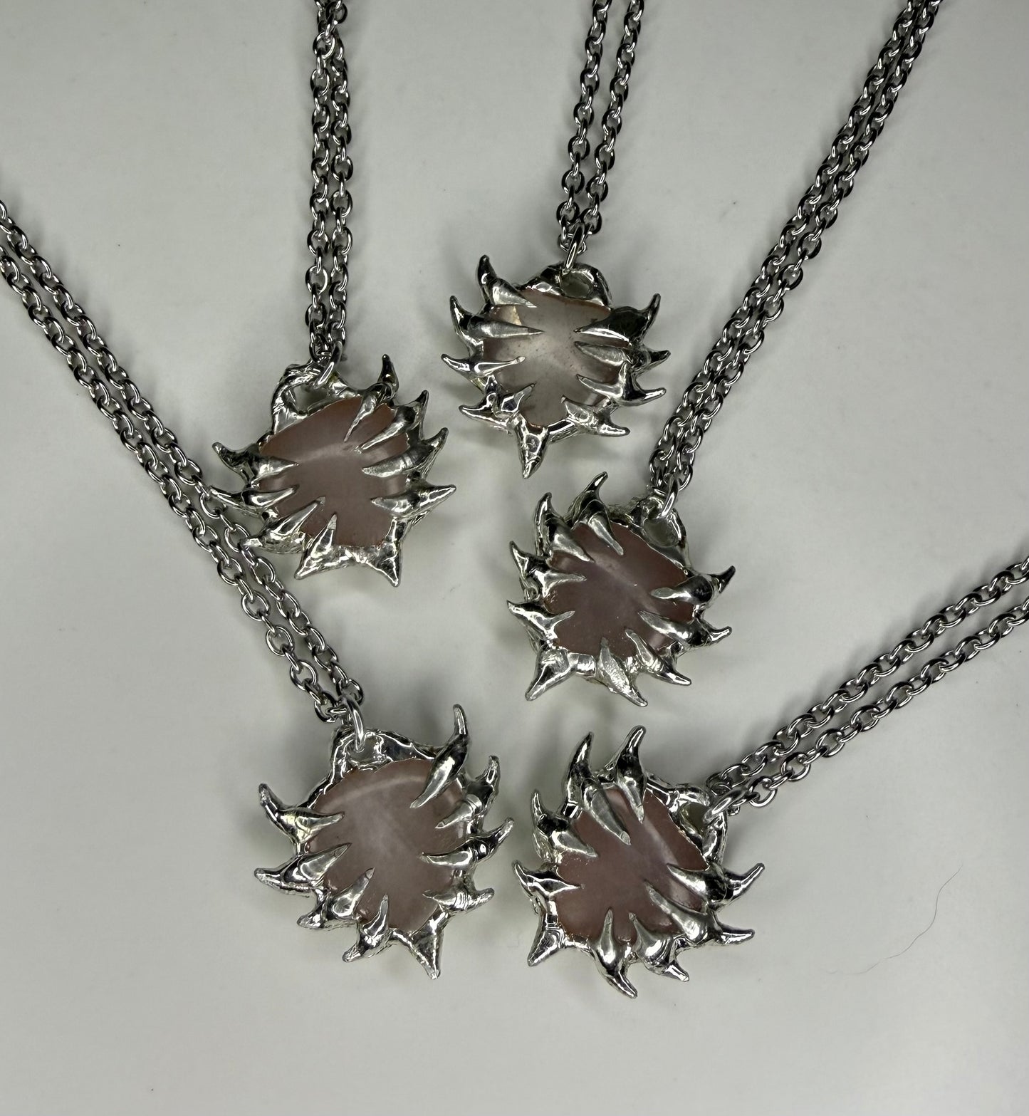 Rose quart spiked hearts