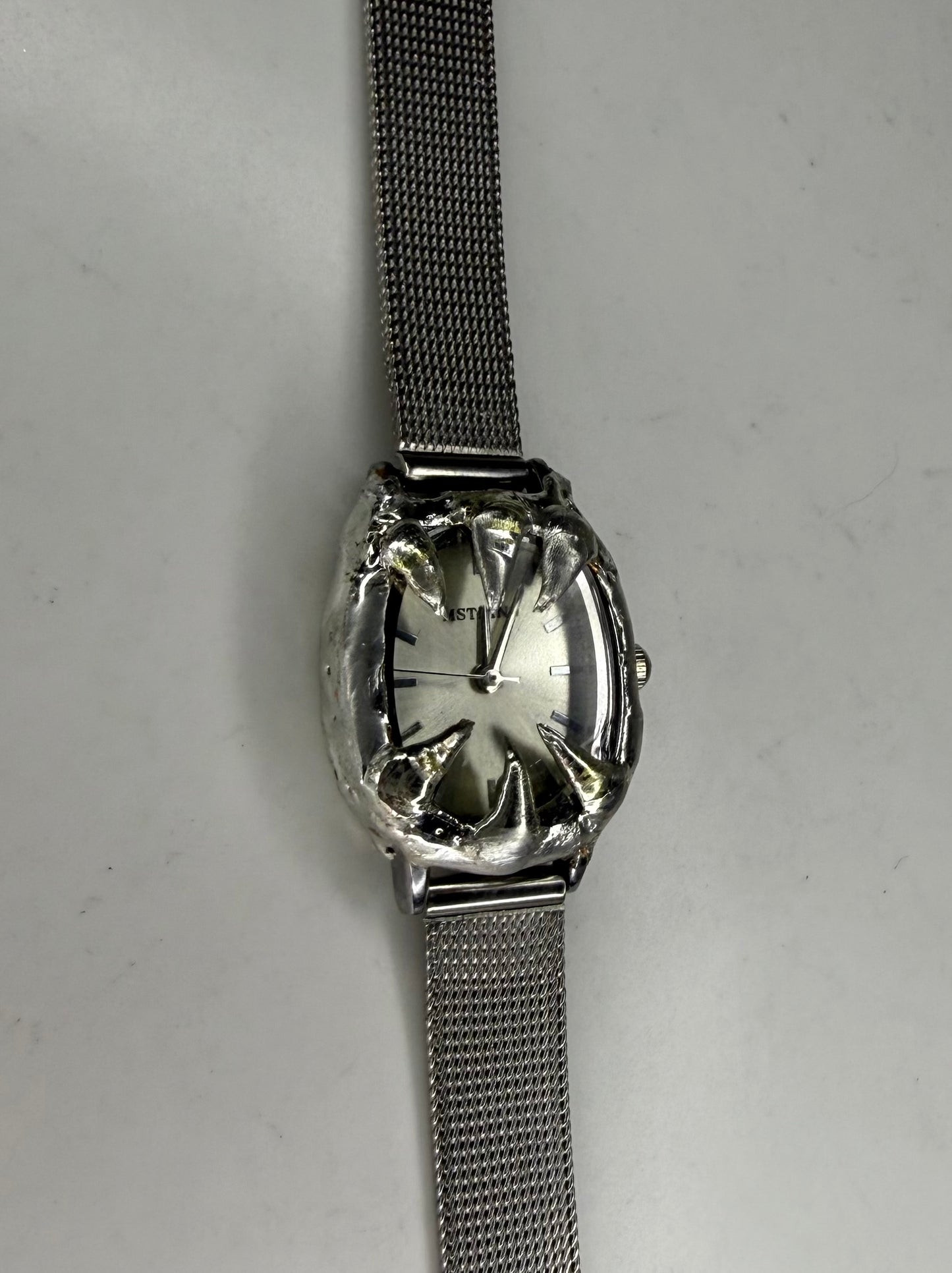 White spiked watch