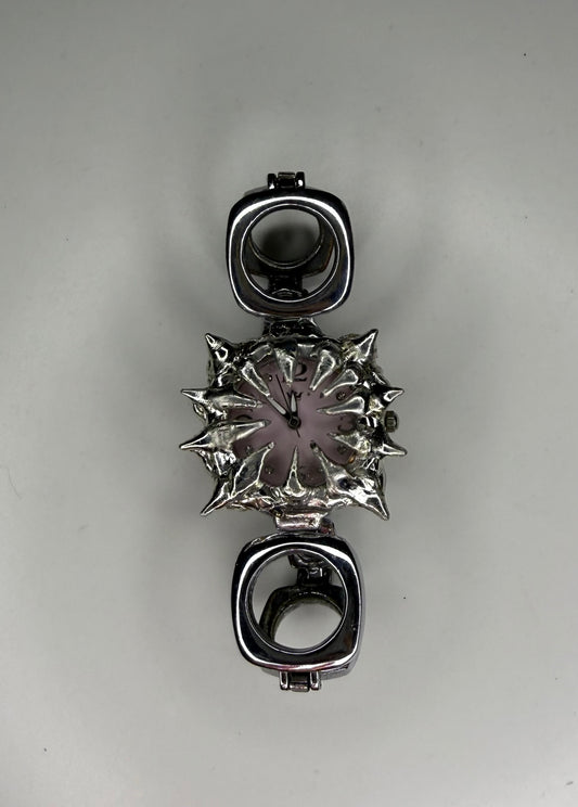 Pink spiked oval band watch