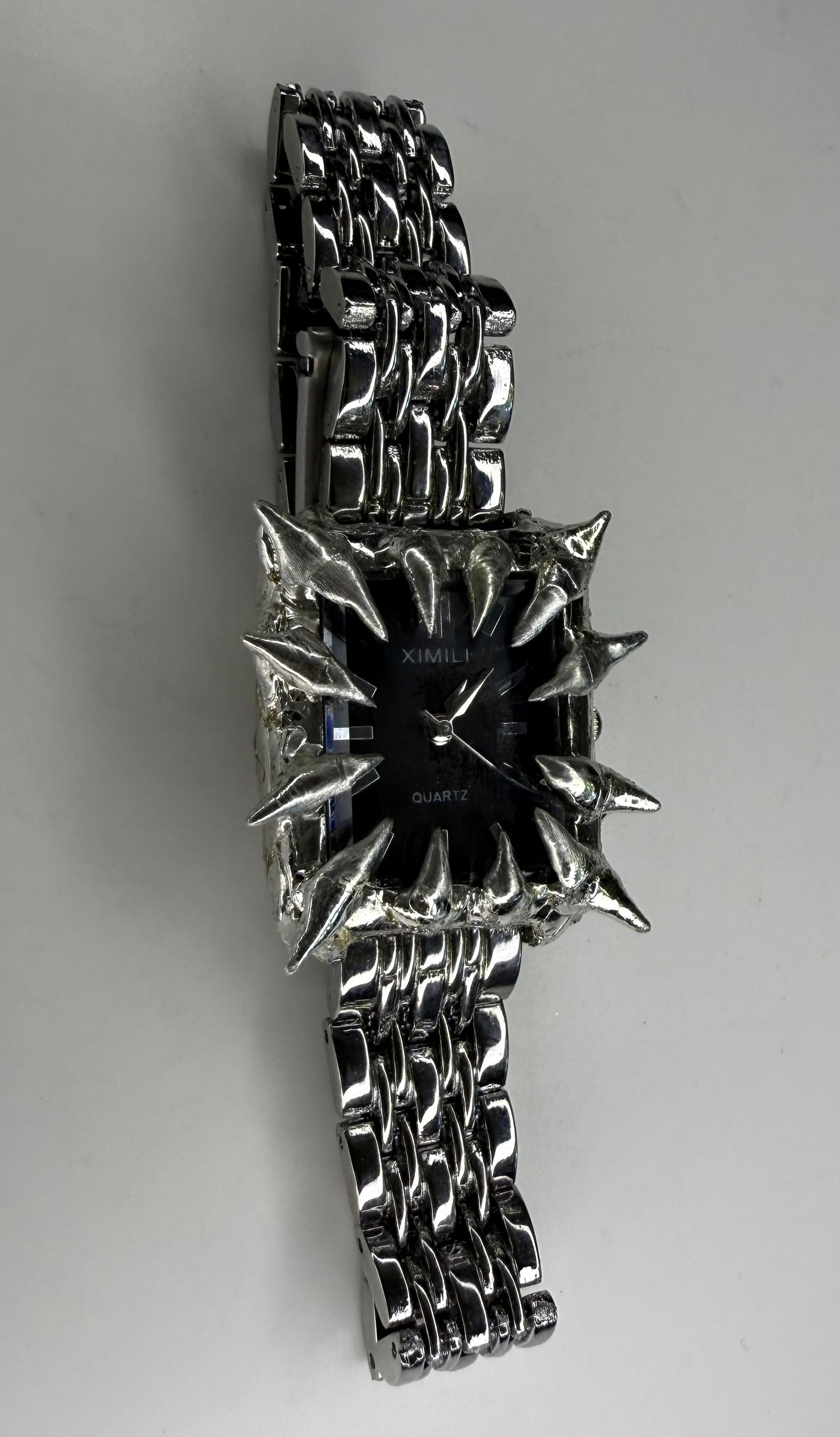 Black spiked watch