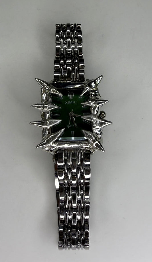 Green spiked watch
