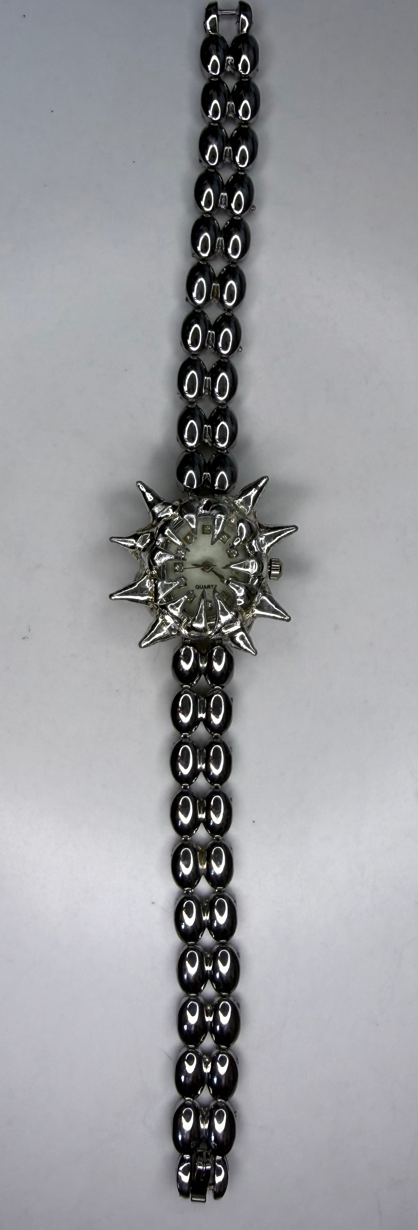 White spiked Watch