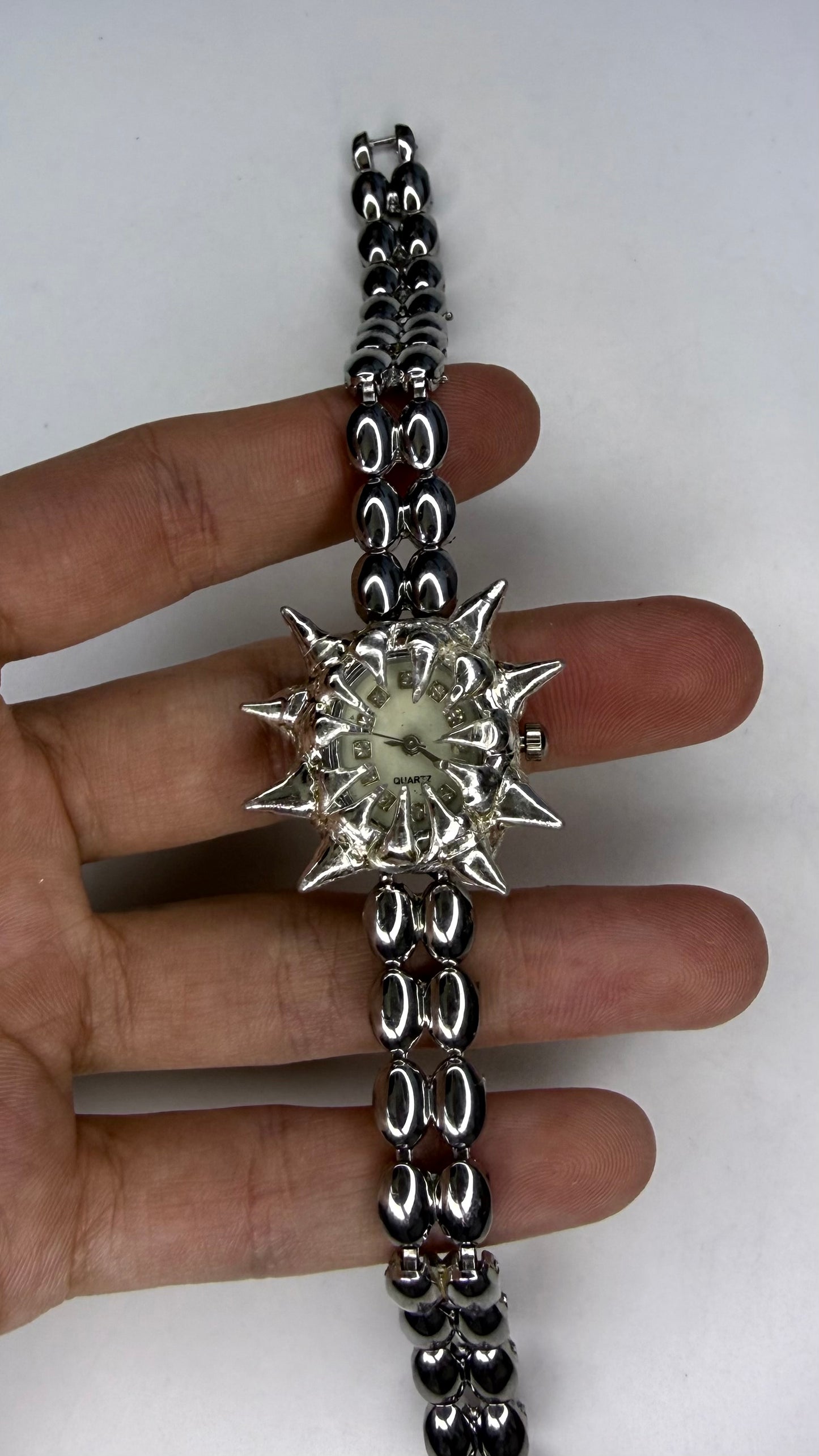 White spiked Watch