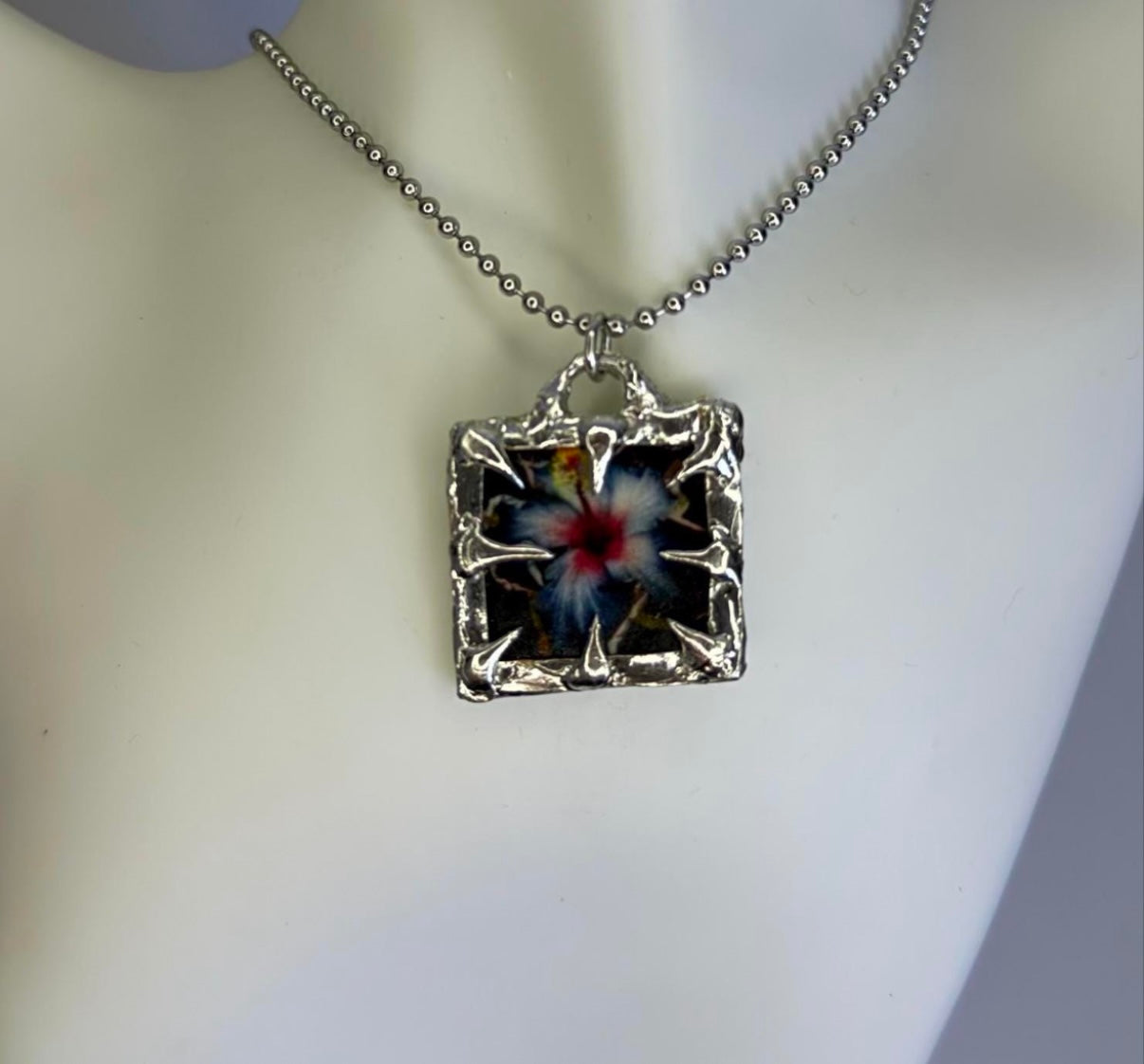 Spiked Flower Pendants