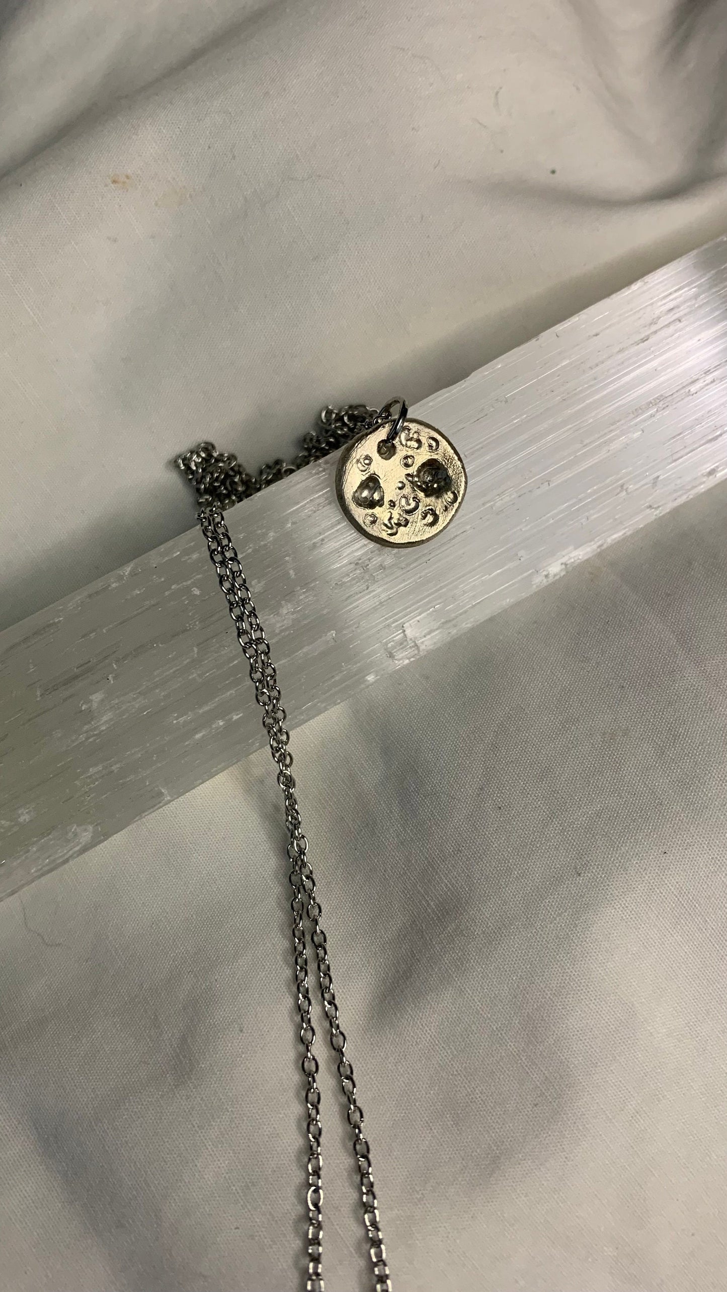 Silver moon pendants
