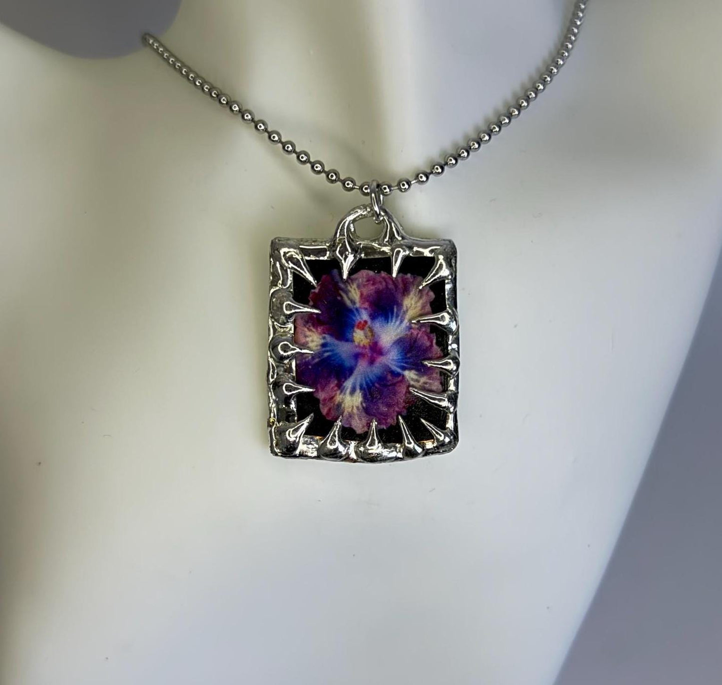 Spiked Flower Pendants