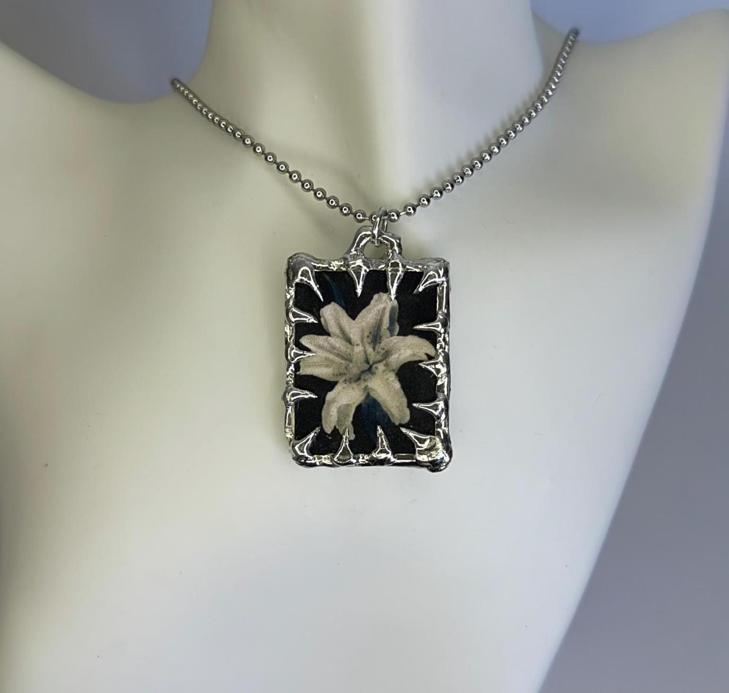 Spiked Flower Pendants